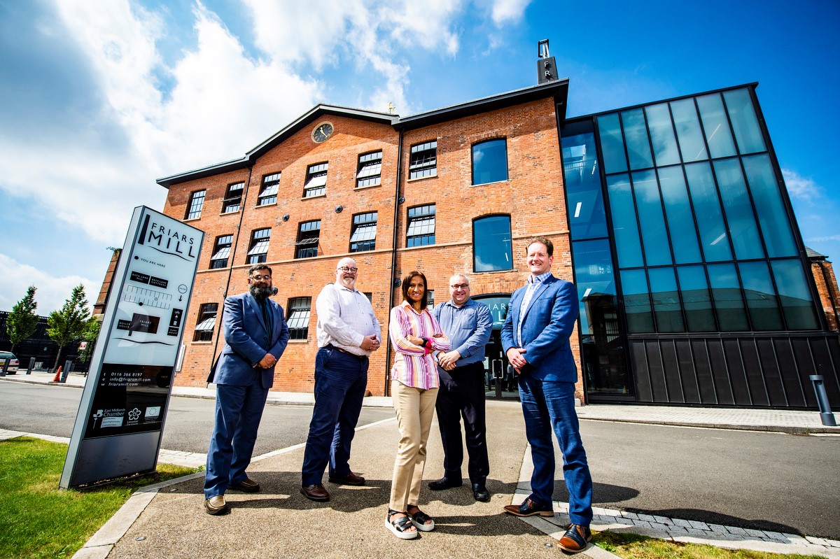 Image-of-people-standing-outside-Friars-Mill