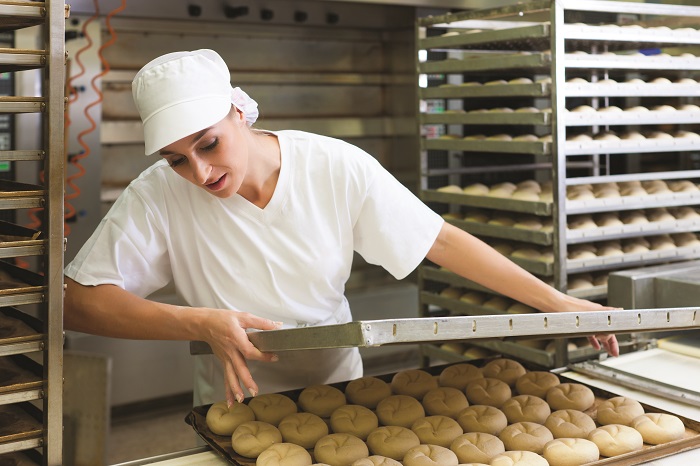 Image-of-female-baker-with-bread-rolls