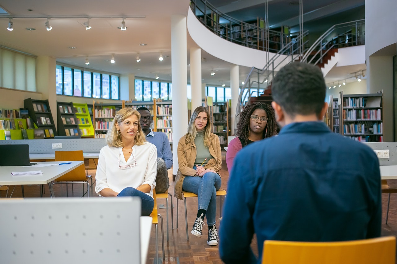 person-presenting-to-group