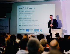 Man presenting on stage