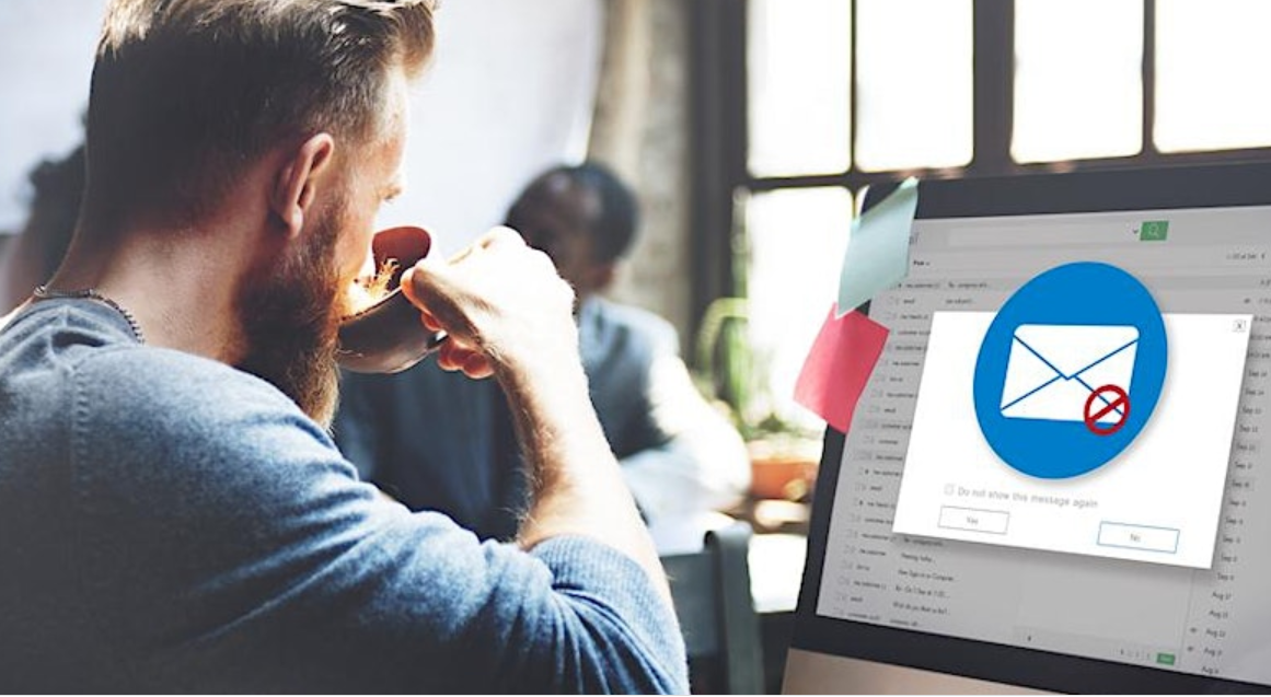 man looking at computer screen 